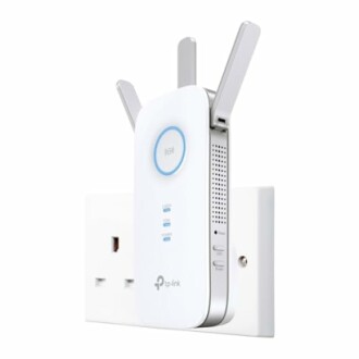 TP-Link WiFi extender plugged into wall outlet