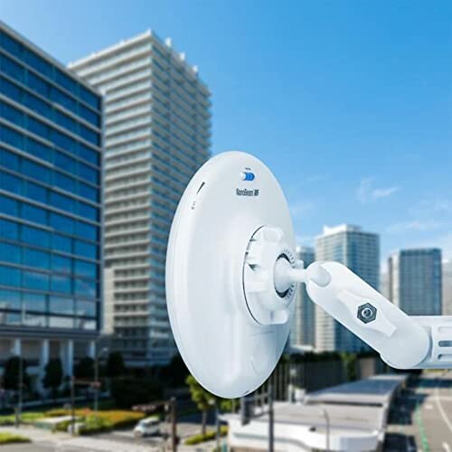 Satellite dish with city skyline in background